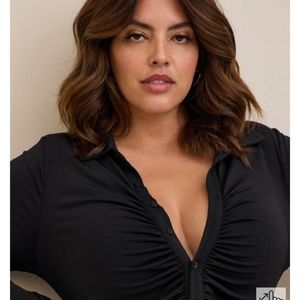 New with tags TORRID Sexy, elegant,  slimming jumpsuit size 1. I